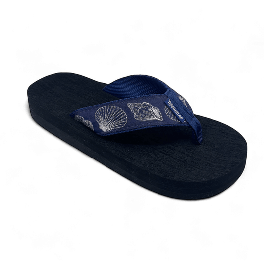 Navy flip flop with soft navy straps and embroidered silver seashells, designed with contoured black comfort footbed