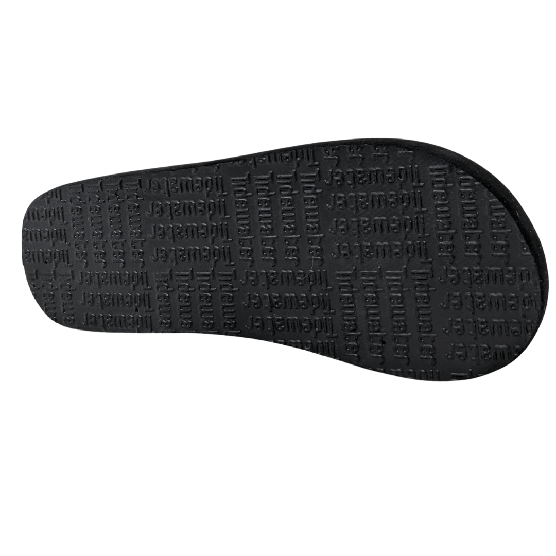 Black sandal sole featuring textured grip pattern for comfort and stability in Starry Daisy Nights style.