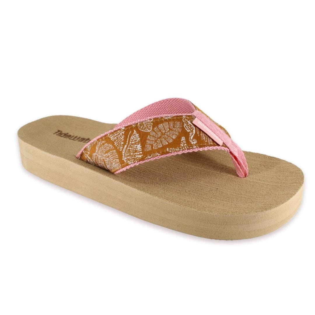 Dottie Sealife flip-flop featuring a pink strap and a patterned footbed with seashell designs on a light wooden sole.